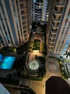 an overhead view of a courtyard in a city with tall buildings at Venice Luxury Residences Emanuele in Manila