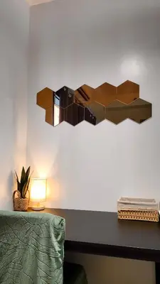 a shelf on the wall next to a table with a lamp at Staycation near NAIA, MOA with PS4, Netflix & Karaoke in Manila