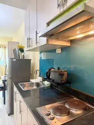a kitchen with a counter with a pot and a sink at Sea Residences Tower B Condotel Look F0R MaV in Manila
