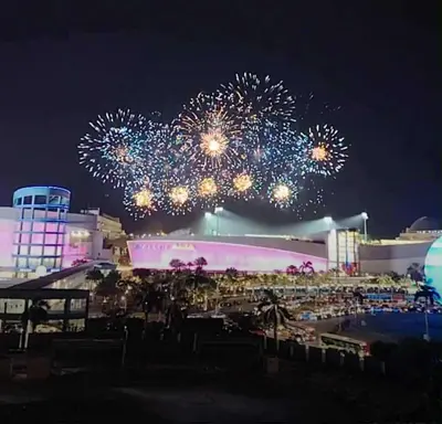 an event with fireworks in the background at night at Juliza's MOA Staycation in Manila