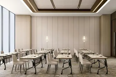 a dining room with tables and chairs and windows at AC Hotel by Marriott Manila in Manila
