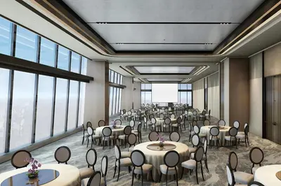 a banquet hall with tables and chairs in a room with windows at AC Hotel by Marriott Manila in Manila