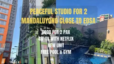 a sign for a school for in a city at Comfy Studio for 2 at Sunshine100 in Mandaluyong Fully equipped in Manila
