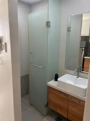 a bathroom with a sink and a shower at Comfy Studio for 2 at Sunshine100 in Mandaluyong Fully equipped in Manila