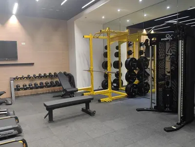 a room with a gym with a lot ofngth at Elements Residences 1br fully furnished with balcony in Manila