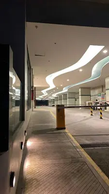an empty hallway of an airport with a building at Elements Residences 1br fully furnished with balcony in Manila