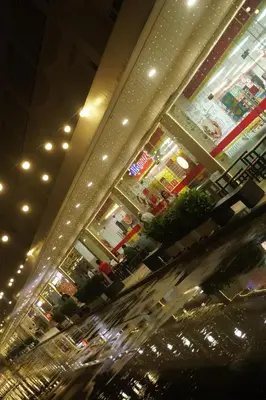 a view of a shopping mall at night at Modern Staycation near MOA & NAIA with PS4, Netflix, Wi-Fi in Manila
