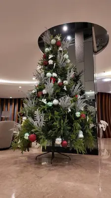 a christmas tree in the middle of a room at City View Near MOA & NAIA with PS4, Wi-Fi, Netflix in Manila