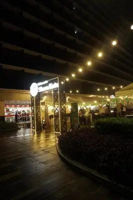 a night view of a building with lights at City View Near MOA & NAIA with PS4, Wi-Fi, Netflix in Manila