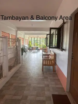 a hallway and balcony area of a house at Jarens Diner in Silang