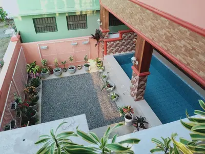 an overhead view of a swimming pool in a house at Jarens Diner in Silang