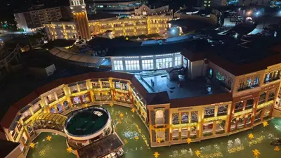 an aerial view of a building at night at Venice Condotel in Manila