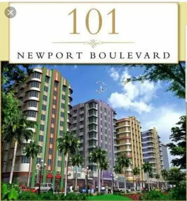 a sign for a newport boulevard with tall buildings at A&G Condotel Right Across NAIA Terminal 3 in Manila