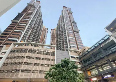 two tall buildings in a city at Affordable 1BR Condo In Pasay with Balcony and Amenity View, Free Pool Fast WiFi Near NAIA Airport , MOA,PICC in Manila