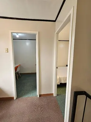 a room with a door leading to a bedroom at Cozy Bian Getaway - Entire House for Rent in Biñan