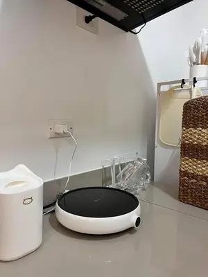 a black and white appliance sitting on a counter at Sweetluxx - SMDC Green 2 Residences Staycation in Dasmariñas