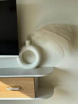 a white bowl sitting on top of a desk with a computer at AlRBNB Mandaluyong - by Jam Es in Manila