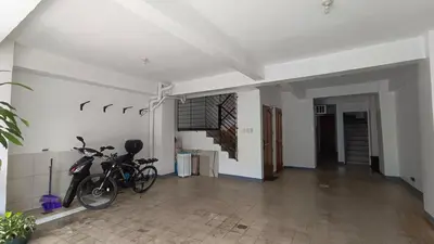 a room with a bike parked in a room at Makati 2C Suite Room in Manila