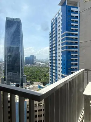 a view from the balcony of a building at The Ellis Luxe Suites in Manila
