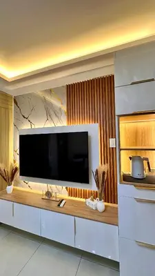 a large flat screen tv in a living room at Warm & Homey Staycation Suite in Manila