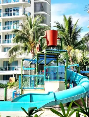 a water slide at a resort with a water park at Azure Urban Resort Residences in Manila