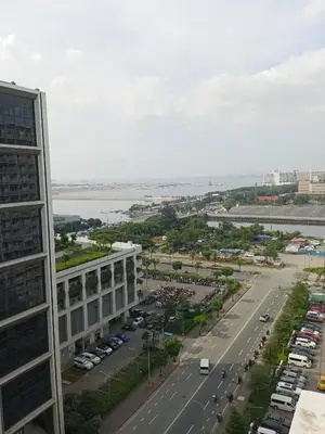 an aerial view of a city with a parking lot at MP shore 1 c2 unit 1567 in Manila