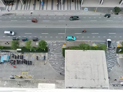 an aerial view of a city street with cars at MP shore 1 c2 unit 1567 in Manila