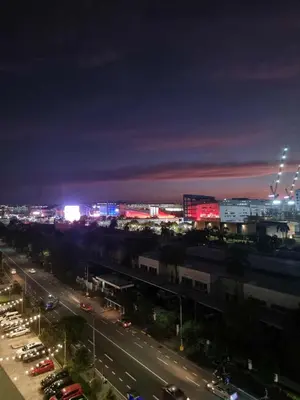 a city at night with cars on a highway at 963 D shore 1 in Manila