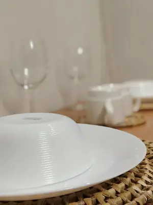 a white plate sitting on top of a table at 963 D shore 1 in Manila