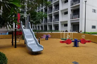 a playground with a slide in front of a building at Urban Luxe Suite - Shore 2 Residences, Steps to Mall of Asia Complex, Pasay City in Manila