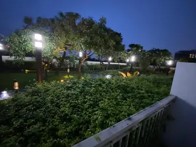 a view of a park at night with a street light at Kasara T14K Cozy Abode in Manila