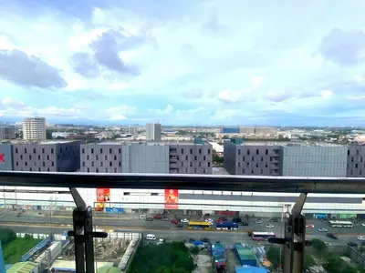 a view of a parking lot in a city at Manila City Center Executive Apartments near Ayala Mall and PITX in Manila