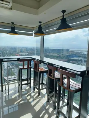 a bar on the floor of a building at Your Home Near the Airport in Manila