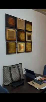 a table with a purse on top of it at Tala Vera condotel at Newport Pasay in Manila