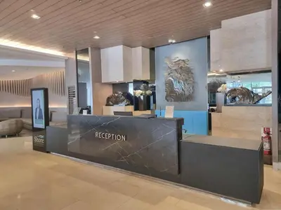 a museum with a reception desk in a building at 1586 Shore Residences tower C2 in Manila
