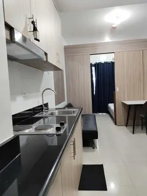 a kitchen with a sink and a counter top at SHORe 2 TOWER 3 UNIT 746 in Manila