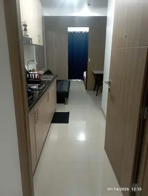 a kitchen with a sink and a counter top at SHORe 2 TOWER 3 UNIT 746 in Manila