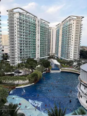 a view of a water park with buildings at Anasa Suites in Manila