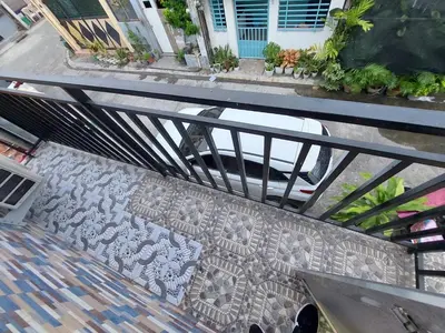 an overhead view of a car driving under a bridge at Affordable Townhouse Imus cavite greenpark villas 2 in Imus