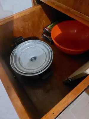 a metal plate in a wooden box with a bowl at Affordable Townhouse Imus cavite greenpark villas 2 in Imus