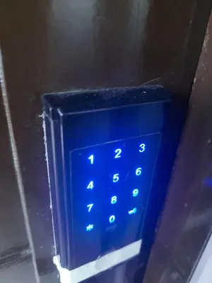 a close up of a blue key board in a machine at Affordable Townhouse Imus cavite greenpark villas 2 in Imus