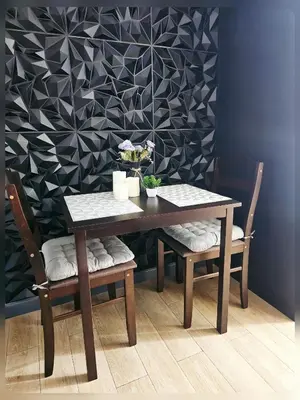 a dining room table with two chairs and a wall at Paseo Verde Condo Unit in Las Pinas - Sleeps 2 Adults & 2 Children in Manila