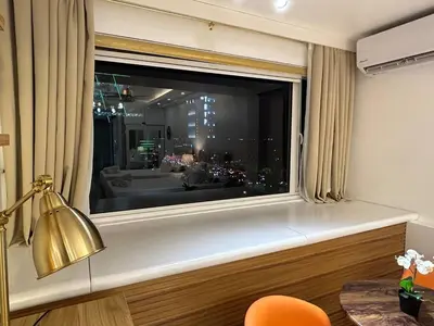 a window in a room with a table and a lamp at Casa Navarro - Estrella in Manila