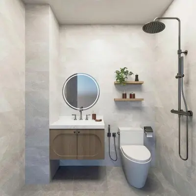 a bathroom with a toilet and a mirror at Llanes A Studio Apartment in Manila