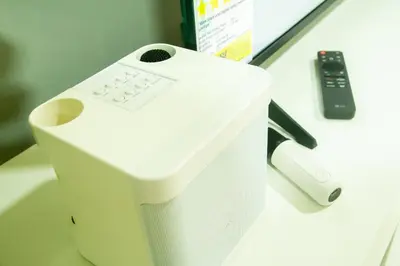 a wii remote control sitting on top of a counter at Nature Serenity Suites 2BR Makati in Manila