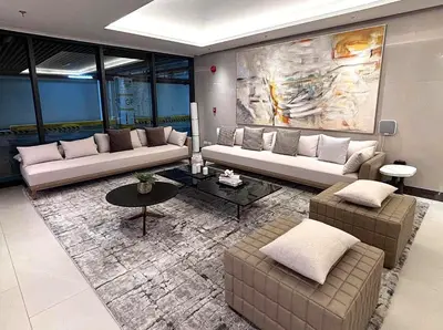 a living room with two couches and a table at Sunnyplace Residences 2 BR Near NAIA Airport in Manila