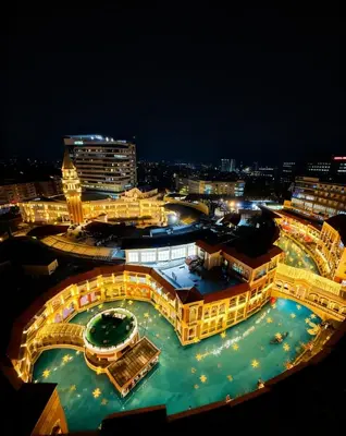 a view of a large pool at night at Venice Luxe Canal View, Pool, Kitchen, Canal Mall Access in Manila