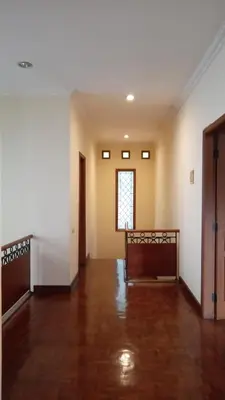 an empty room with a bed in the middle at Happy Place Antipolo in Antipolo
