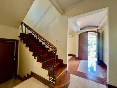 a hallway with a staircase in a house at Happy Place Antipolo in Antipolo