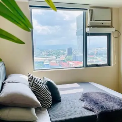 Minimalist 1BR Condo at Araneta City